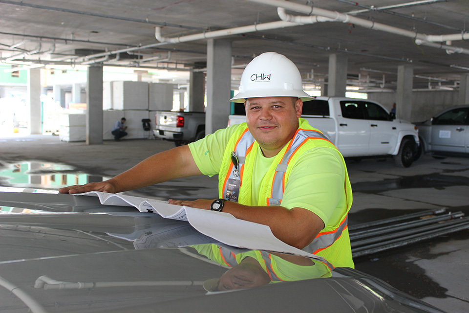 Land Surveyor at the Lofts on Jefferson Topping out in Jacksonville, FL