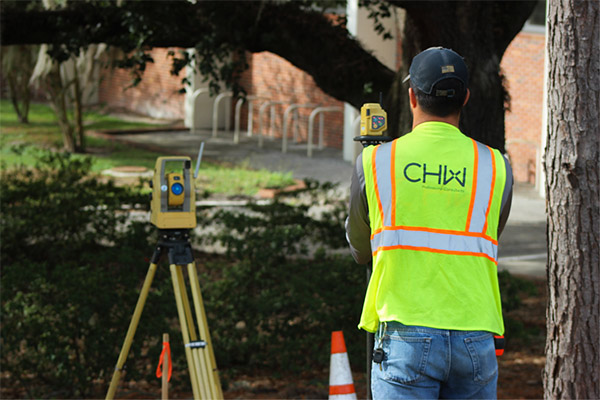 CHW Land Surveyor surveying the site of the future DSIT Building at the University of Florida in Gainesville, FL