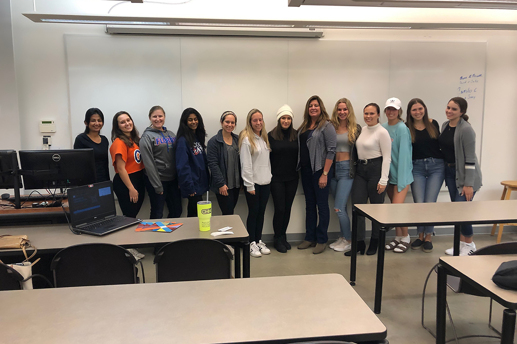 NAWIC Women in Construction Presentation Group Photo with Gina Goodyear, Senior Project Manager of Construction Services, and Students